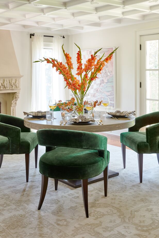 The rear saber legs of the Ella Accent Chairs echo the curves of chairs’ backs as well as those of the round tabletop. And while the rug is rectangular, its winding botanical motifs give it a decidedly unboxy fluidity. Find a similar rug here. Photo by Frank Francis.
